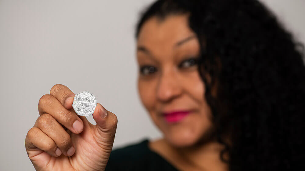 Dominique Evans with Diversity Coin.jpg