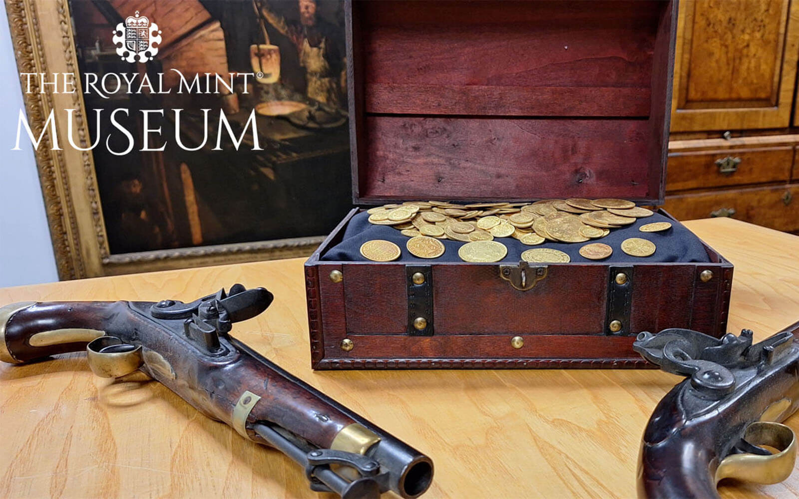 Pirate's treasure chest and old fashioned guns