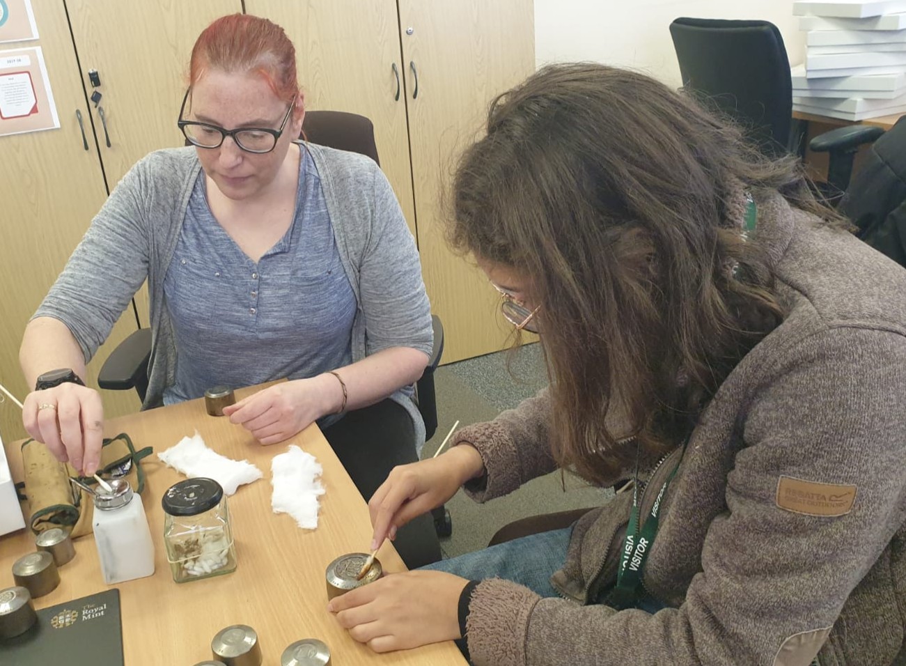 Susan Sandford showing Indigo how to clean tooling