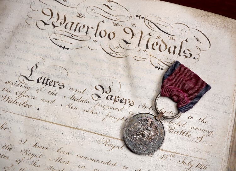 The Royal Mint's original Waterloo roll and Waterloo medal.jpg