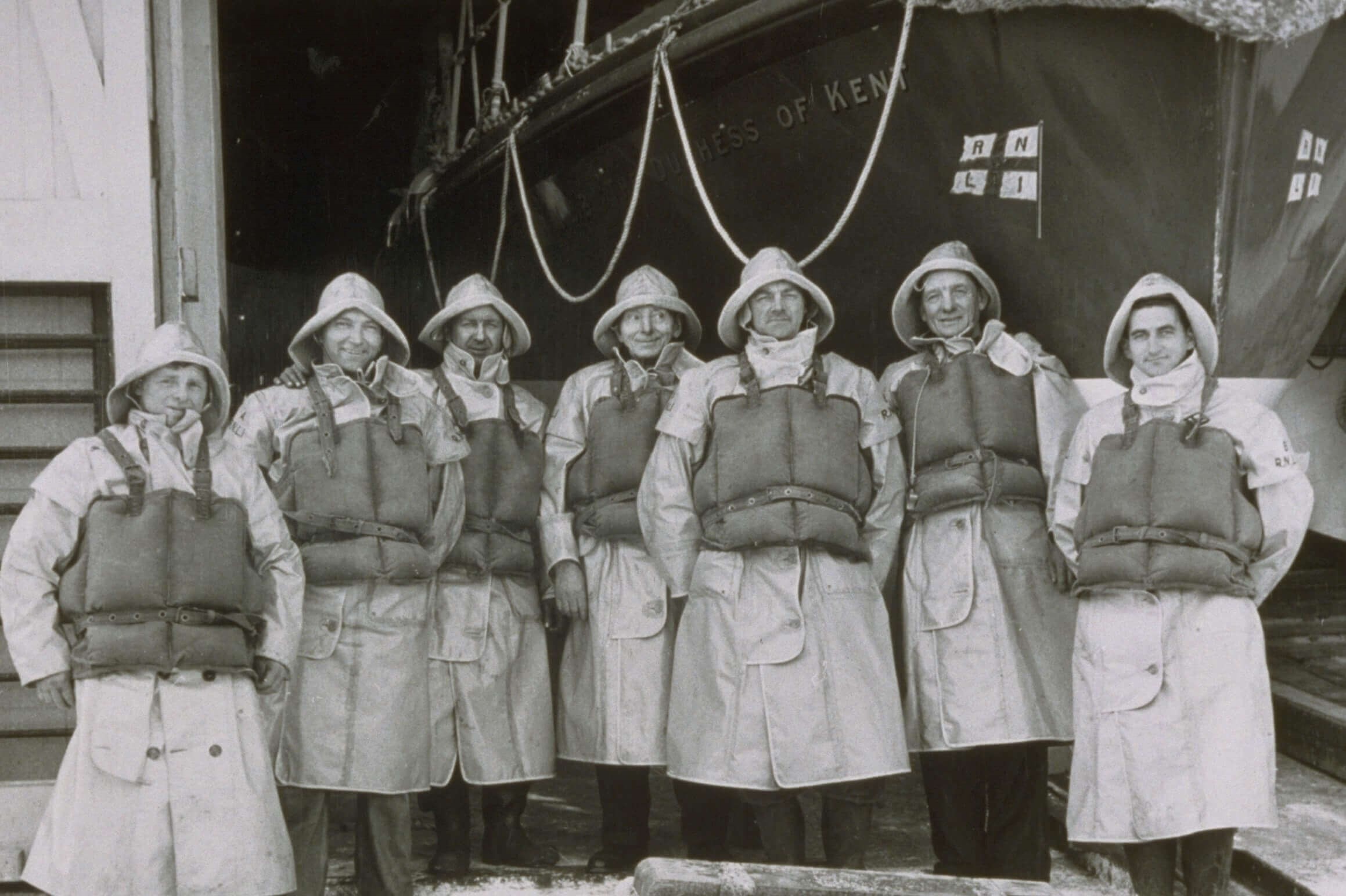 Fraserburgh. Crew of Watson motor ON 908 Duchess of Kent. Sou'westers, oilskins and kapok lifejackets. 1958.jpg