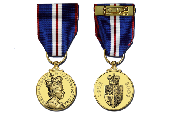 The medal is round and gold with a crowned portrait of Queen Elizabeth on one side and the Royal Arms Shield on the other. It has a blue, red and white vertical striped ribbon.