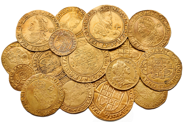 A pile of mixed historical gold coins