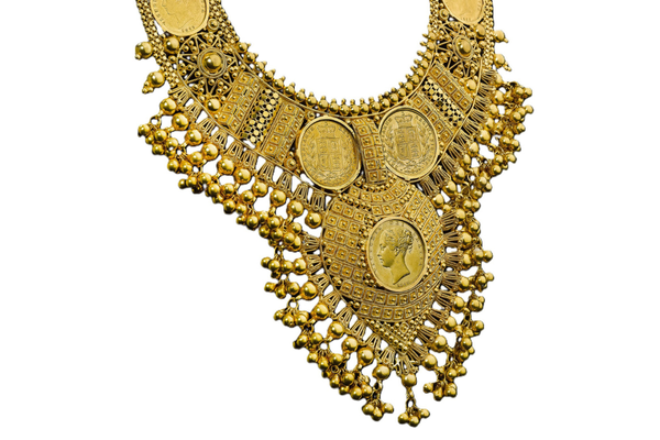 A large beaded gold necklace with sovereigns set in it