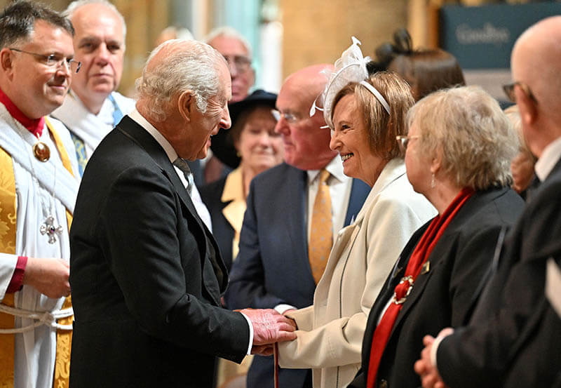 King Charles III giving out Maundy money. Image copyright Alamy